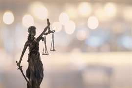 Imagen de la balanza de justicia del Ministerio de Justicia del Reino Unido