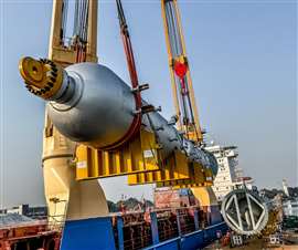 One fo the 360 tonne HDT reactors being lifted onto the heavy lift cargo vessel