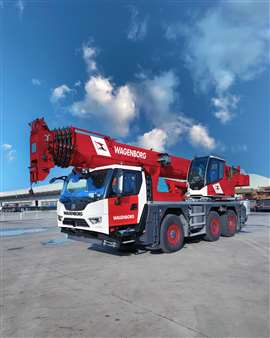 red and white XCMG XCA60 EV all terrain crane for Wagenborg Nedlift