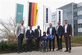 Line up of Liebherr people and the CEO at AMHEC