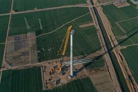 XCMG XCA4000 breaking a lifting record on a 200 MW Chinese wind farm construction project