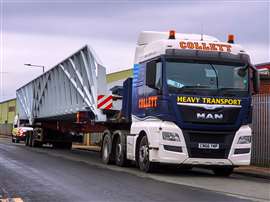 Collett MAN TGX tractor with three axle extendable rear-steer trailer