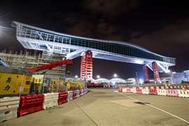 Mammoet Mega Jack in operation lifting an airport passenger bridge high enough for aircraft to pass underneath