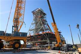 Mobile Launcher 2 pictured after crews successfully placed Mod 4 on top of the tower chair.