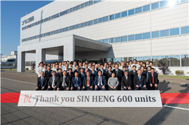 big group outside Kobelco factory
