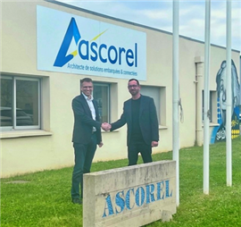 Vincent Thevenet, Ascorel CEO, left and Charlie Guernier, NOV Services founder mark the acquisition deal