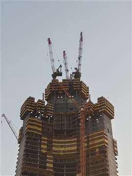 The three Favco cranes on top of the Jeddah Tower