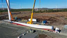 Unloading a 67 metre blade on site