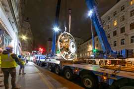 Tandem lifting a cutter head at night