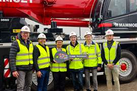 Mammoet and XCMG people in high-vis doing the big key handover