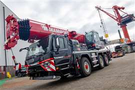 first XCMG XCA60 EV hybrid all terrain crane in red and black Mammoet colours