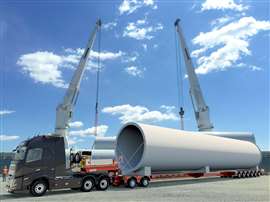 Max810 trailer carrying a wind turbine tower section