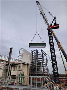 A Marr Contracting Favco M2480D luffing jib tower crane making a lift at Walsall ERF