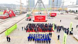 Line up of guests and Zoomlion people at the giant Changde tower crane factory in China