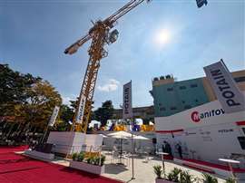 Manitowoc stand at ExCon show in Bangalore with tower crane