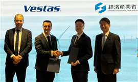 Four smartly dressed men lined up markeing an agreement