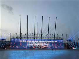 XCMG's own machines were used to suspend a giant screen for the International Customer Festival launch event (Image: KHL Group)