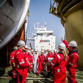 Jumbo crew in red boiler suits