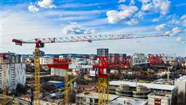 K.I.G.O.-liveried Potain topless cranes with overlapping jib configurations at the Nemanjin Grad site in Belgrade, Serbia. Photo: Manitowoc