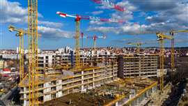 Nine Potain cranes, eight of them topless models, work across the seven-building Nemanjin Grad mixed-use development near Belgrade. Photo: Manitowoc