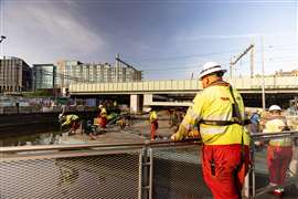 Mammoet crew members work at Amsterdam Centraal Station. Photo: Mammoet