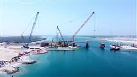 crawler crane bridging over water