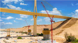 A Wolff 180 B luffing jib crane on the Wadi Laban Valley bridge project. Photo: Wolffkran