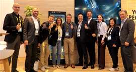 Group of Denzai and Silvasti people at a European trade show