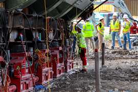 Mammoet crew members monitor the skid shoe system during the lateral installation of the 10,000-tonne Commercial Street Bridge in Pittsburgh. Photo: Mammoet