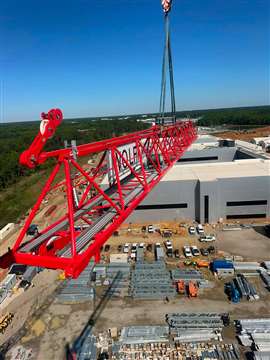 Manœuvrer la flèche rouge d'une grue à tour Wolff 8033