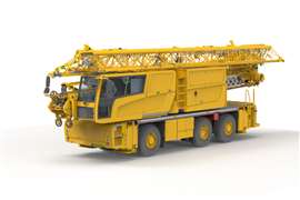 yellow three axle Spierings mobile folding crane