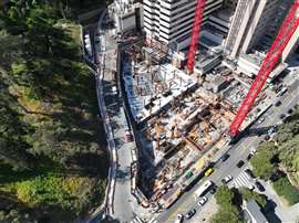 Throughout the entire project, the two WOLFF 1250 B cranes serve as the site’s primary transportation system.Photo: Wolffkran