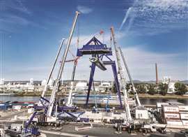 BKL used five wheeled mobile cranes to install a large gantry crane