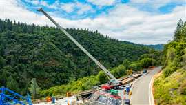 The Link-Belt RTC-80130 SII works on the new Mosquito Road bridge in Placerville, California, replacing a timber structure originally built in 1939. Photo: Link-Belt