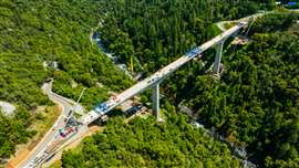 The Link-Belt RTC-80130 SII works on the new Mosquito Road bridge in Placerville, California, replacing a timber structure originally built in 1939. Photo: Link-Belt