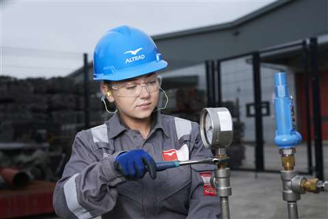 Woman in a blue hard hat