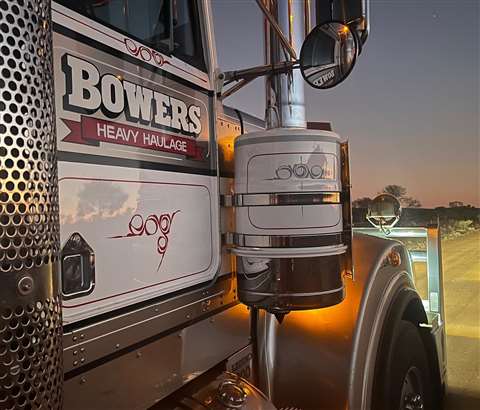 Cab door with Bower's on it at sunset