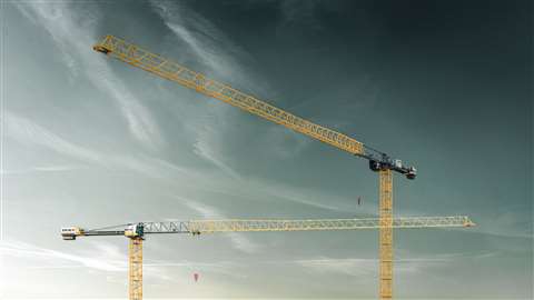 yellow and black tower crane