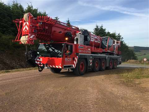 Red AT crane in travel configuration