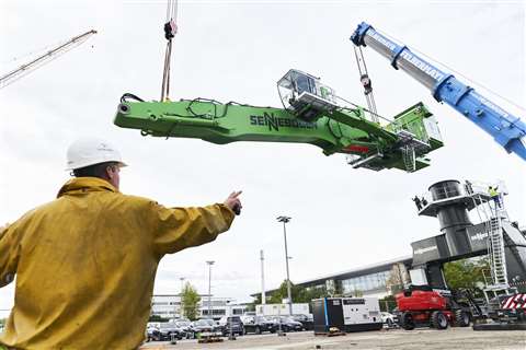 Sennebogen equipment being hoisted 