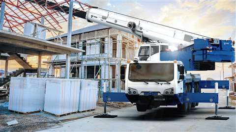 white and blue Tadano all terrain crane