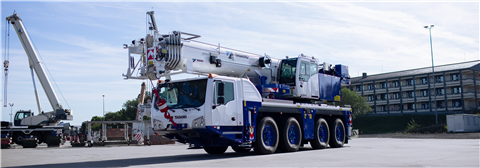 white and blue Tadano all terrain crane