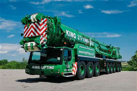 big green liebherr all terrain crane stowed and ready for road travel