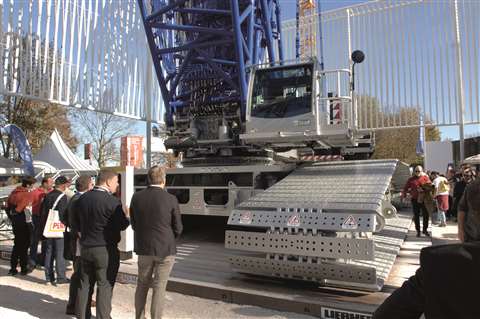 Visitors gather around the Liebherr LR 1700-1.0 crawler crane