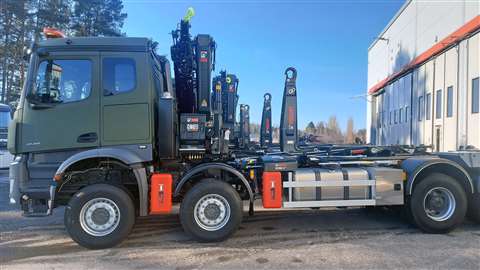 A Mecedes-Benz truck fitted with a Hiab hooklift