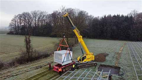 yellow Liebherr telescopic boom crawler crane