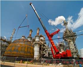 A TNT crane onsire at a industrial plant