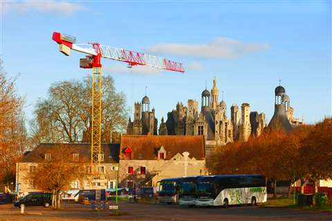 A Potain MDT 178 is working on the visitor center expansion at the Château de Chambord in Loire Vall