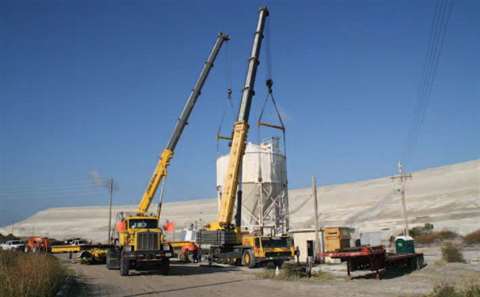 Lifting a 180,000 pound silo and transporting it to a plant a half a mile away, Crane Rental Corp. u