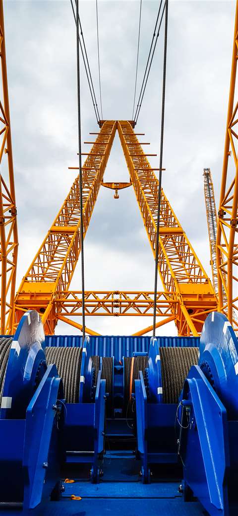A view of the winches and the twin booms from the rear deck looking forward on the Sarens SGC-90